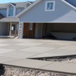house with new concrete driveway