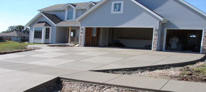 house with new concrete driveway