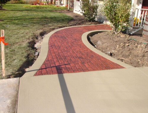Create a Welcoming Entrance to your home with Concrete Sidewalk Installation