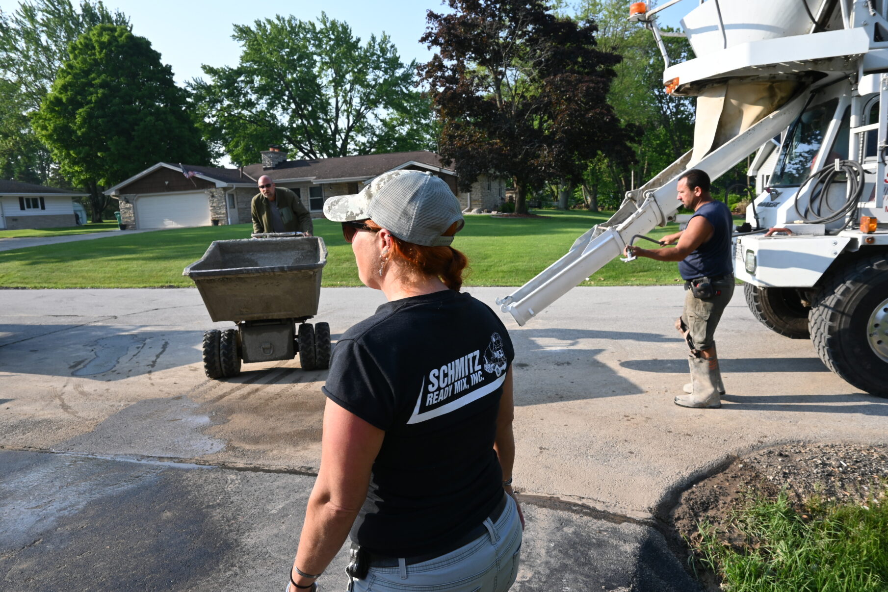 Concrete crew and ready-mix delivery team coordinating a pour in Germantown